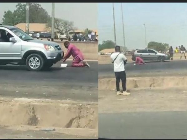 [VIDEO]: Man Spotted Praying On A Busy Road  In Abuja | MarvelTvUpdates