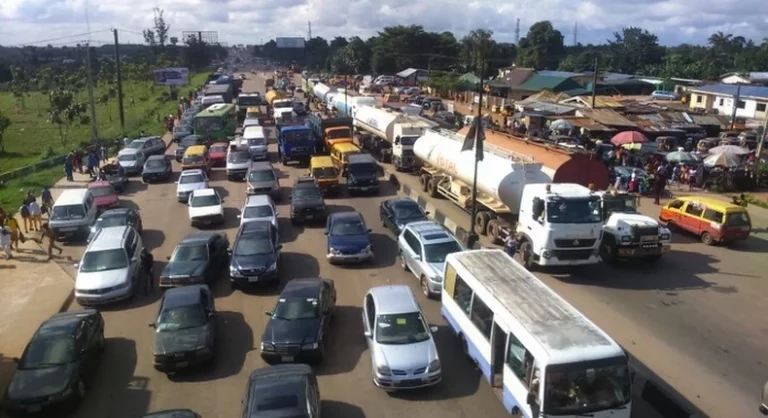 [PHOTOS]: UNIBEN Students Stage Protest Against ASUU Strike, Block Benin-Ore-Sagamu Expressway | MarvelTvUpdates