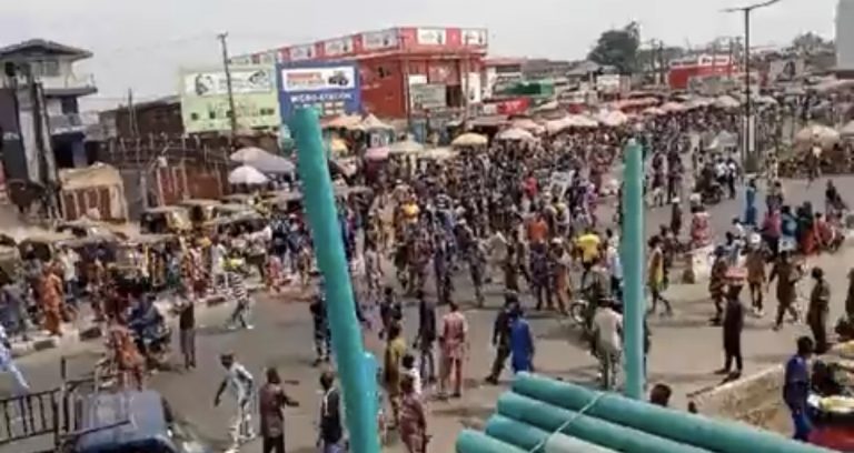 [VIDEO]: Protest In Ibadan Over Fuel Price Hike, New Naira, As Angry Youths Vandalize Banks | MarvelTvupdates